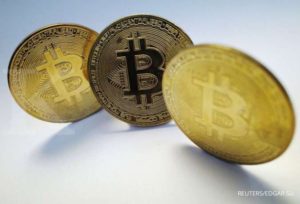 Bitcoin, Mata Uang Krypto. (foto : Reuters/Edgar SU)