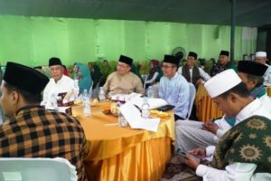 Ketua PCNU Palembang, K.H. Hendri Zainuddin Al Qodiri, bersama Sekretaris Daerah Kota Palembang, Ratu Dewa