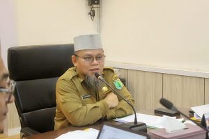 Asisten Pemerintahan dan Kesejahteraan Rakyat Sekretariat Daerah (Setda) Muba, Yudi Herzandi, menggelar rapat mediasi bersama dengan pihak PT. Berkat Sawit Sejati (BSS) dengan warga,di ruang rapat Sekretaris Daerah (Sekda) Muba, hari Senin tanggal 25 Maret 2024. (bekisarmedia.id/eka sahputra)