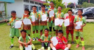 Pemain di Sekolah Sepak Bola Palembang Soccer Skills yang berhasil mendapatkan gelar juara kedua pada pada turnamen sepak bola antar SSB Kelompok Umur U-12 Tahun di Ajendam II Sriwijaya, pada hari Minggu, tanggal 22 Desember 2024. (BekisarMedia.id/Angga Putra)