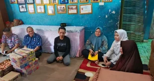 AKBP Rifka Fathoni Dit Intelkam Polda Sumsel santunan panti asuhan Hari Bhayangkara 80.