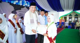 Bupati Kabupaten Muba, Toha Tohet, menghadiri Peringatan Tahun Baru Islam 1 Muharram 1448 Hijriah, Haflah Akhirussanah Angkatan ke-V, sekaligus Milad ke-17 Taman Pendidikan Al-Qur'an (TPA) Nurul Ilmi di Desa Sungai Angit, Kecamatan Babat Toman, pada hari Minggu, tanggal 14 Juni 2026. (BEKISARMEDIA.ID/HAIRUDIN)