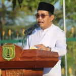 Pemerintah Kabupaten (Pemkab) Musi Banyuasin (Muba) memfasilitasi pelaksanaan ibadah salat Hari Raya Idul Adha 10 Dzulhijjah 1447 Hijriah. Agenda tahunan keagamaan ini dipusatkan di halaman Pendopoan Griya Bumi Serasan Sekate, pada hari Rabu, tanggal 27 Mei 2026. (BEKISARMEDIA.ID/HAIRUDIN)