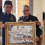 Warga Desa Talang Buluh, Kabupaten Banyuasin, menyelenggarakan acara tasyakuran dan doa bersama pada hari Kamis, 17 September 2026. (BEKISARMEDIA.ID/WAHYUDI)